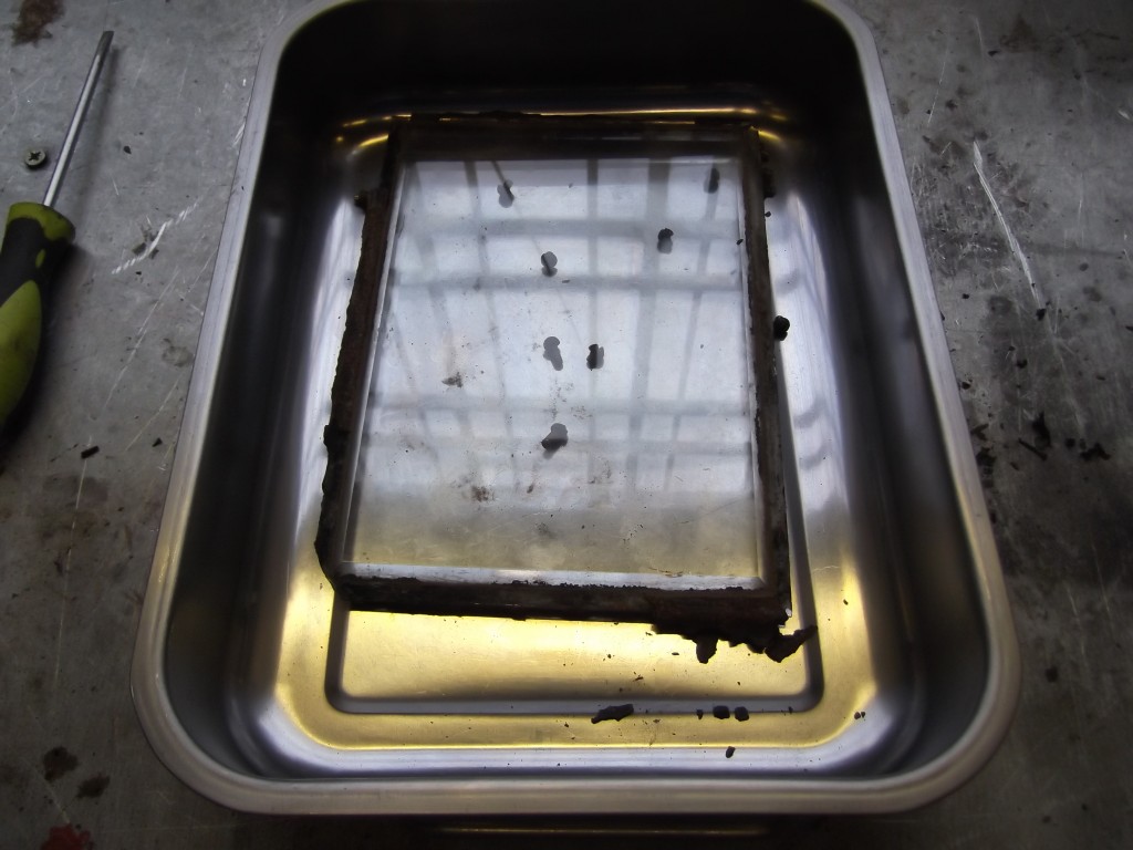 The glass is removed and cleaned